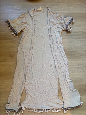 Long wrap/shawl with trim detail
